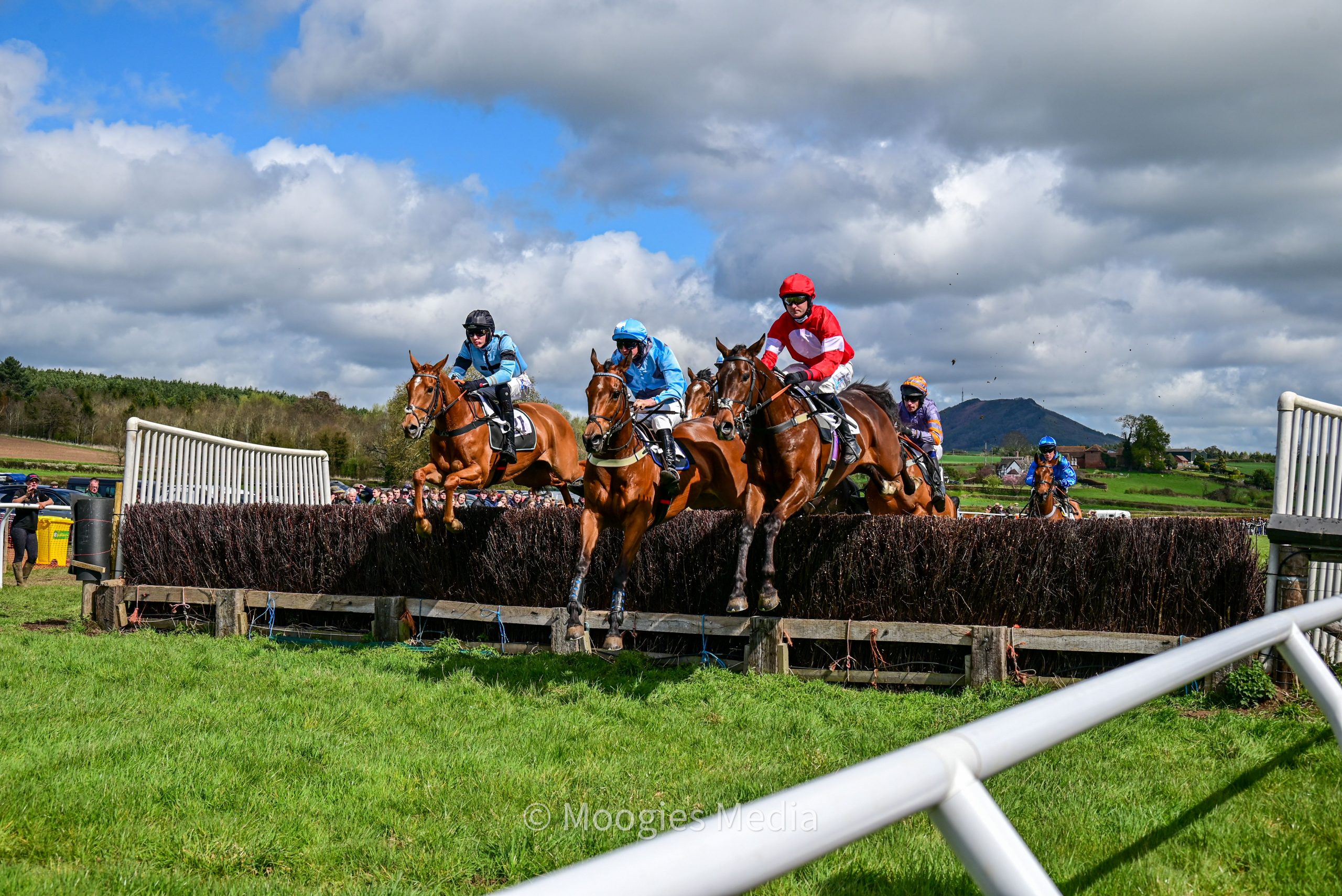 Racehorses jumping the last fence at Eyton Point toPoint Races